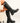 Schwarze hohe Stiefel mit Gummiband und goldenen Details