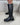 Schwarze Stretch-Stiefel mit doppelter Schnalle und silberfarbenen Schnallen