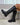 Schwarze Stiefel mit doppelter Schnalle, Seitenansicht