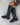 Schwarze Stretchstiefel von oben