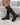 Braune Stretchstiefel, getragene Seitenansicht