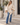Knot Poncho in Beige – lifestyle