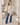 Knot Poncho in Beige – spiegelselfie
