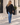 Knot Poncho in Black – lifestyle