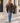 Knot Poncho in Brown – lifestyle